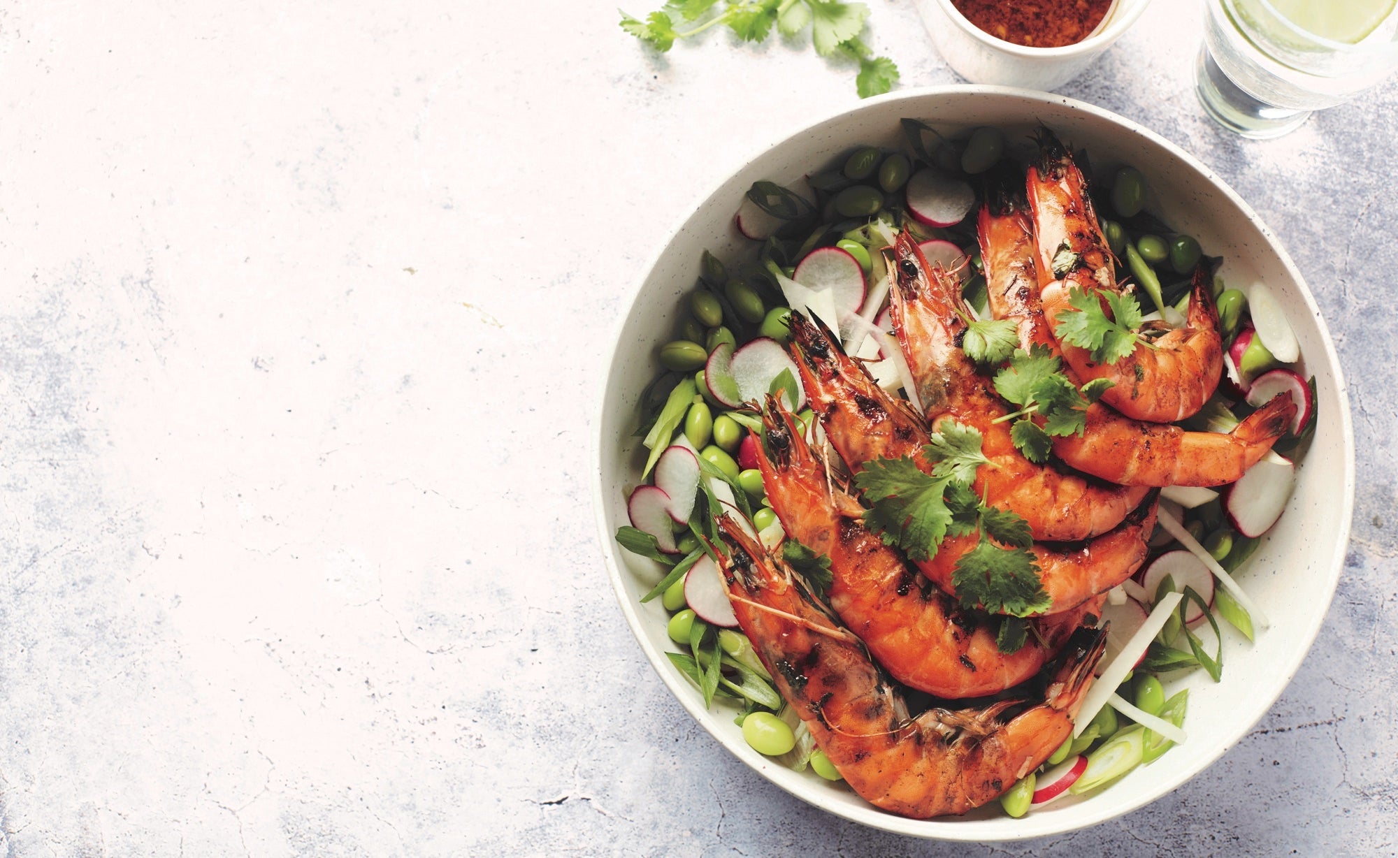 Grilled prawns on the BBQ with edamame salad