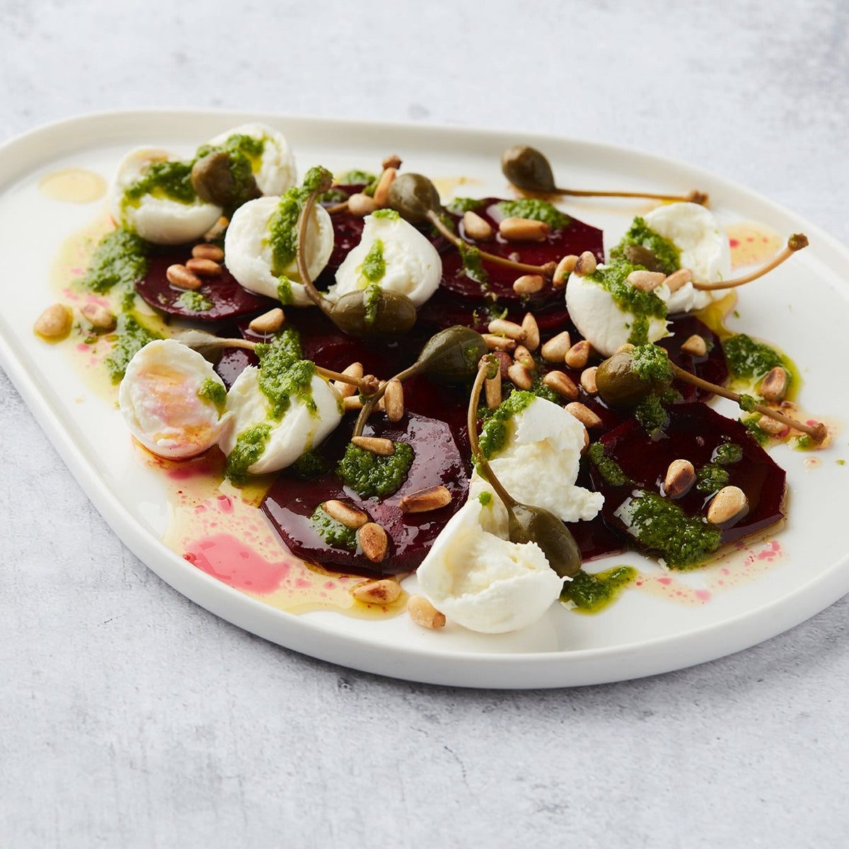Smoked beets in the smoker with buffalo mozzarella and basil oil – Barbecook